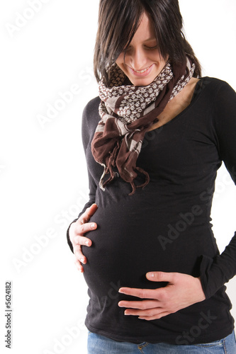 young pregnant woman on white background