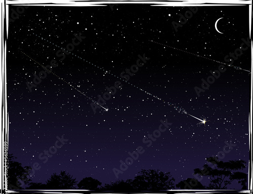 Three shooting stars at night.