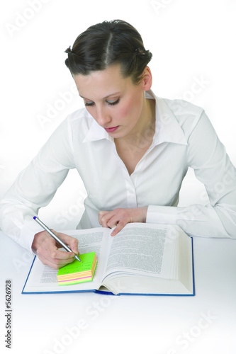 Happy young woman reading books - isolated