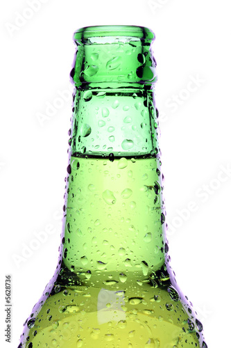 beer bottle isolated on white, wet green bottle closeup