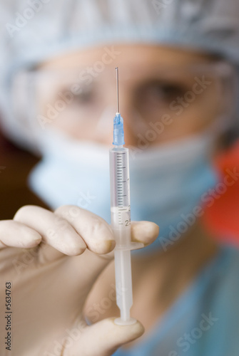 Disposable syringe for injection