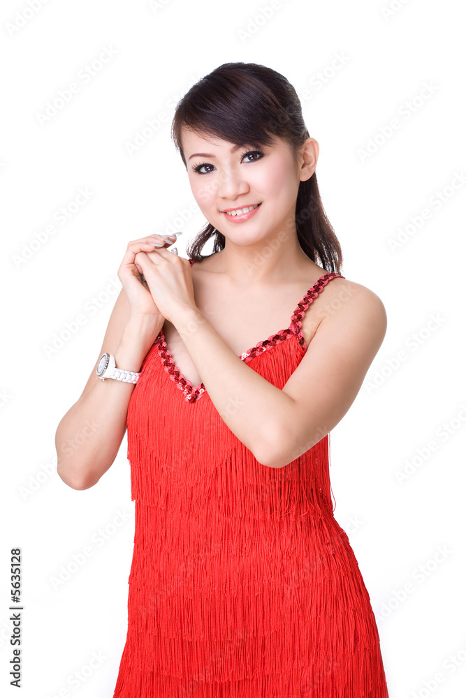 smiling chinese girl in red dress holding both hands smiling chinese girl in red dress holding both hands