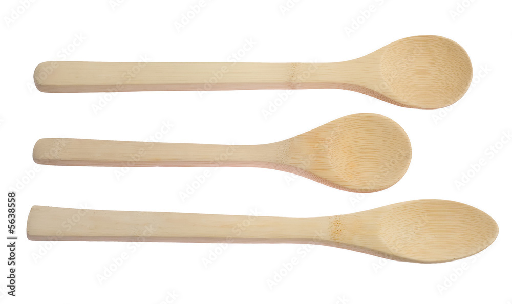 three wooden spoons isolated on white background three wooden spoons isolated on white background