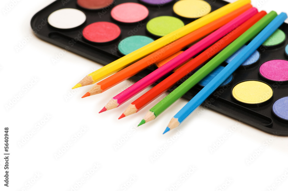 Palette and pencils isolated on the white Palette and pencils isolated on the white