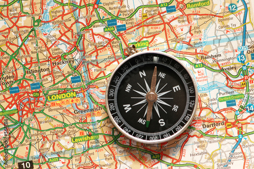 Compass over the map of UK - London suburbs © Elnur