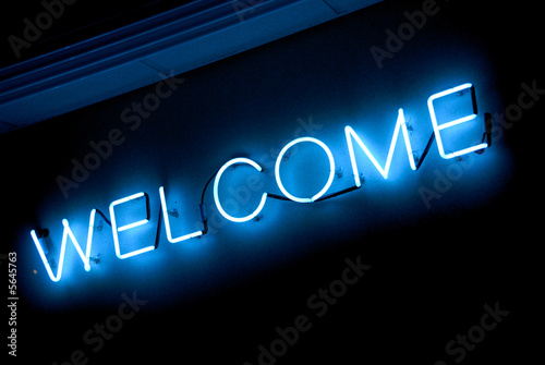neon "welcome" sign