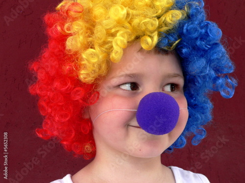 Little clown with colored wig photo