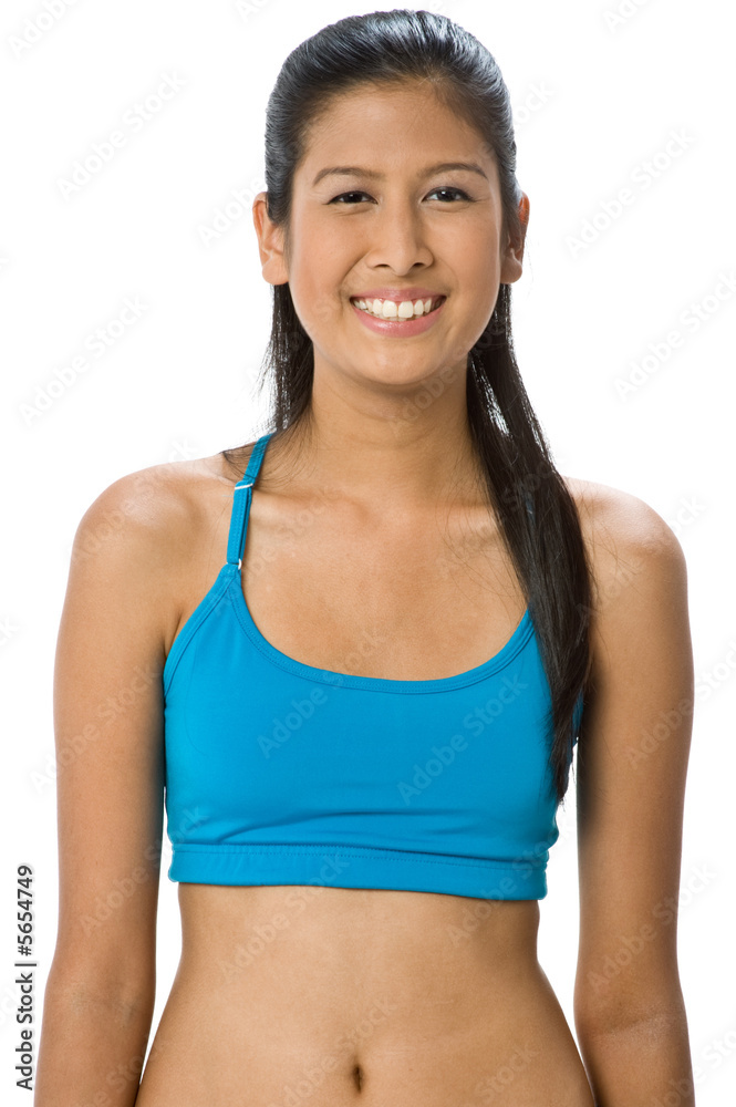 An attractive mixed-race woman in blue sportswear An attractive mixed-race woman in blue sportswear