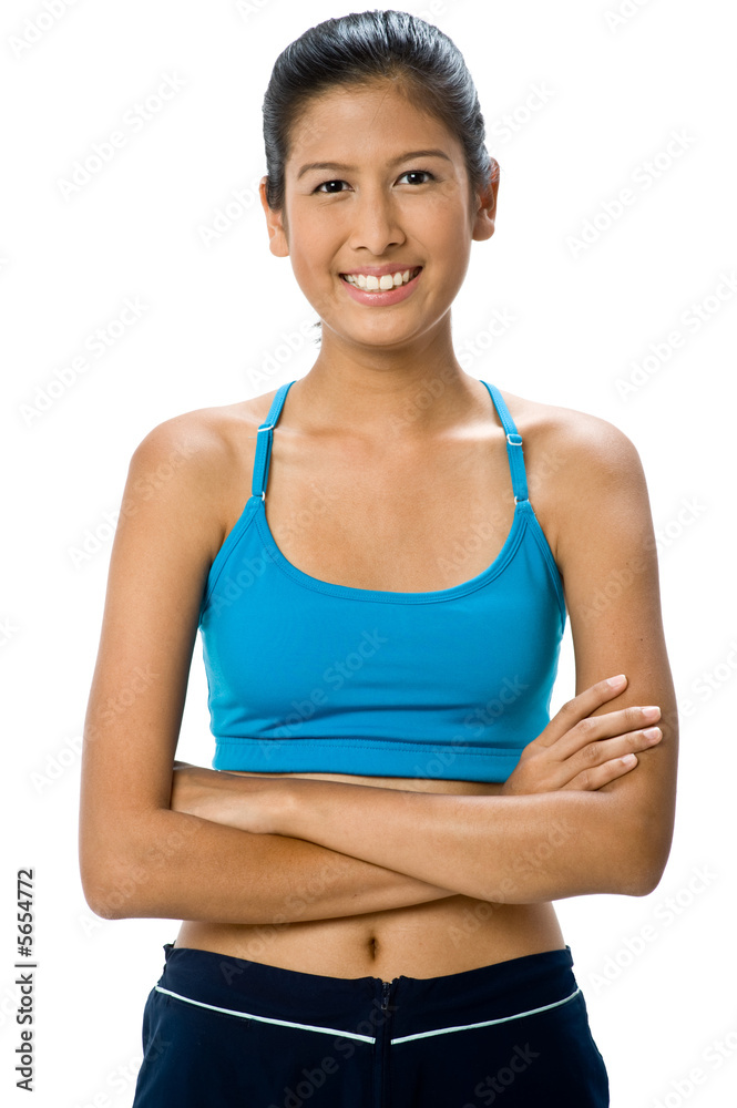An attractive mixed-race woman in blue sportswear An attractive mixed-race woman in blue sportswear