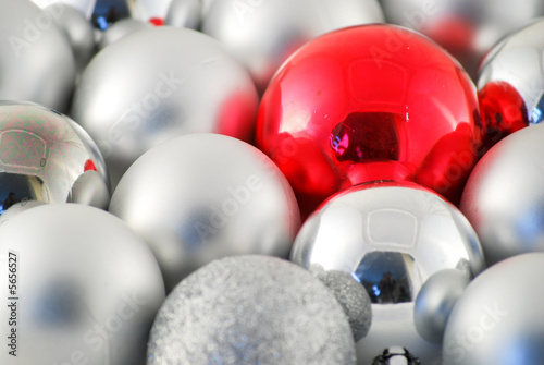 Random silver and one red christmas ball