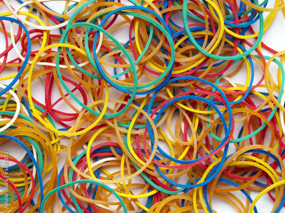 Collection of colored rubber bands as background