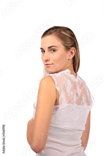 Model with delicate white dress looking left