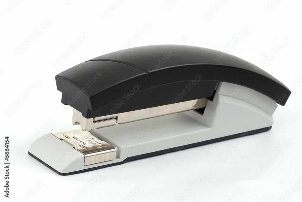 Paper stapler macro isolated on the white background Paper stapler macro isolated on the white background