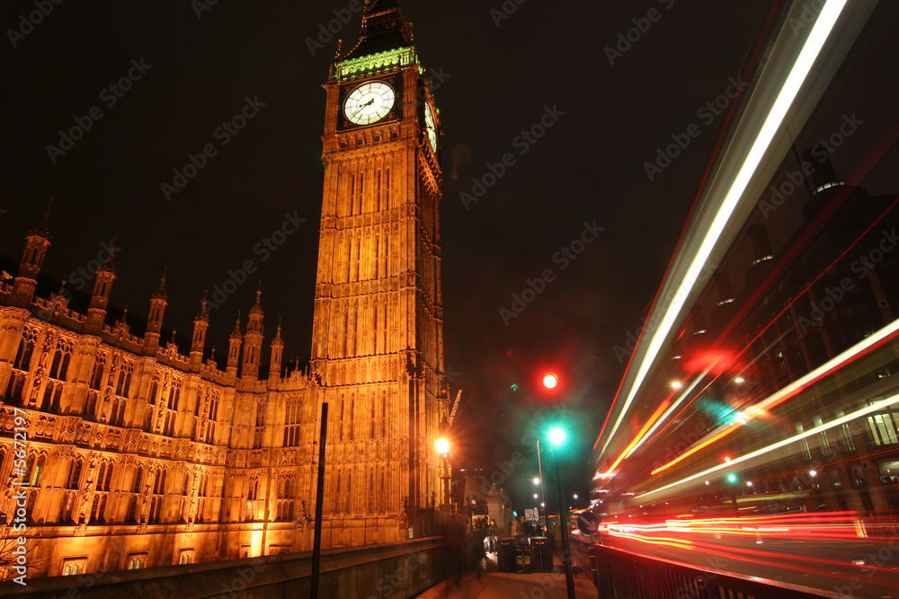 Big Ben with nighttrime traffic trails of light