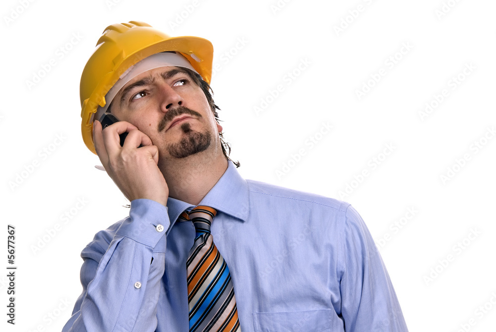 An engineer with yellow hat, isolated on white An engineer with yellow hat, isolated on white