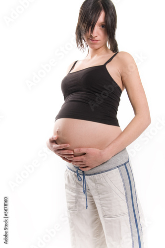 young pregnant woman on white background