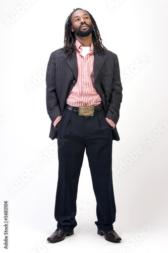A black man with dreadlock hair isolated on a white background.