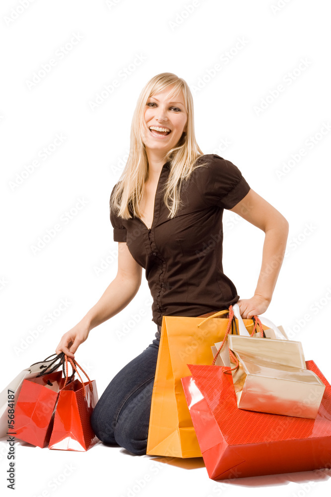 Femme qui fait du shopping Photos Adobe Stock