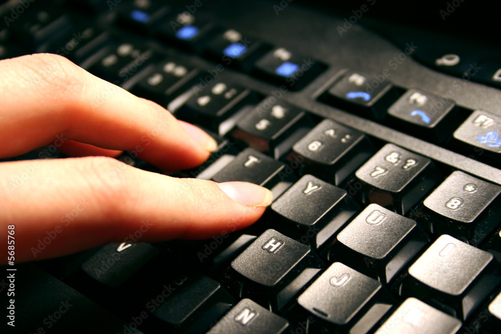 hand on the keyboard hand on the keyboard