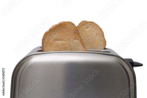 Toast popping out of a stainless steel toaster 