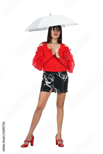 The beautiful girl poses with a umbrella © Hunta