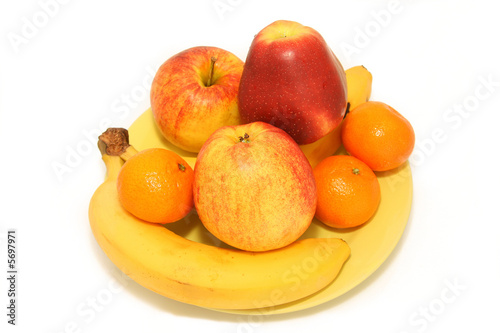 Tasty, ripe, large fruit on a yellow plate