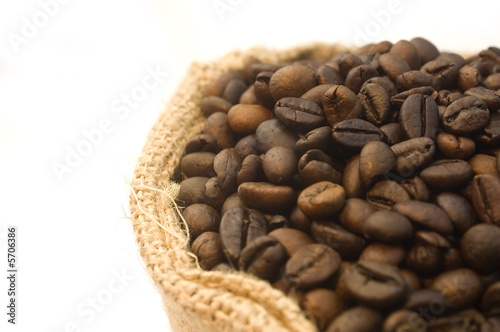 Burlap bag of coffee beans detail