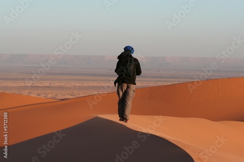 Man observer  sand desert