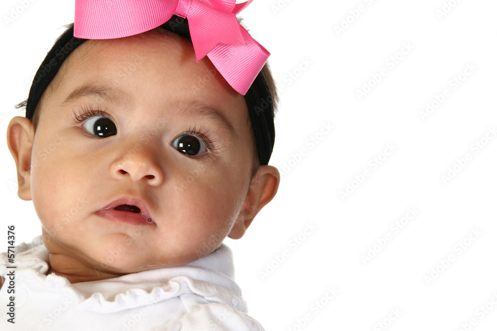 Close up of beautiful Hispanic 3 month old baby girl. Close up of beautiful Hispanic 3 month old baby girl.
