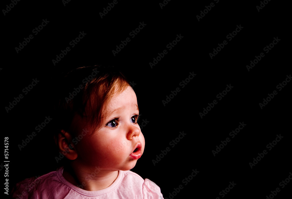 Brave baby girl looking forward Brave baby girl looking forward