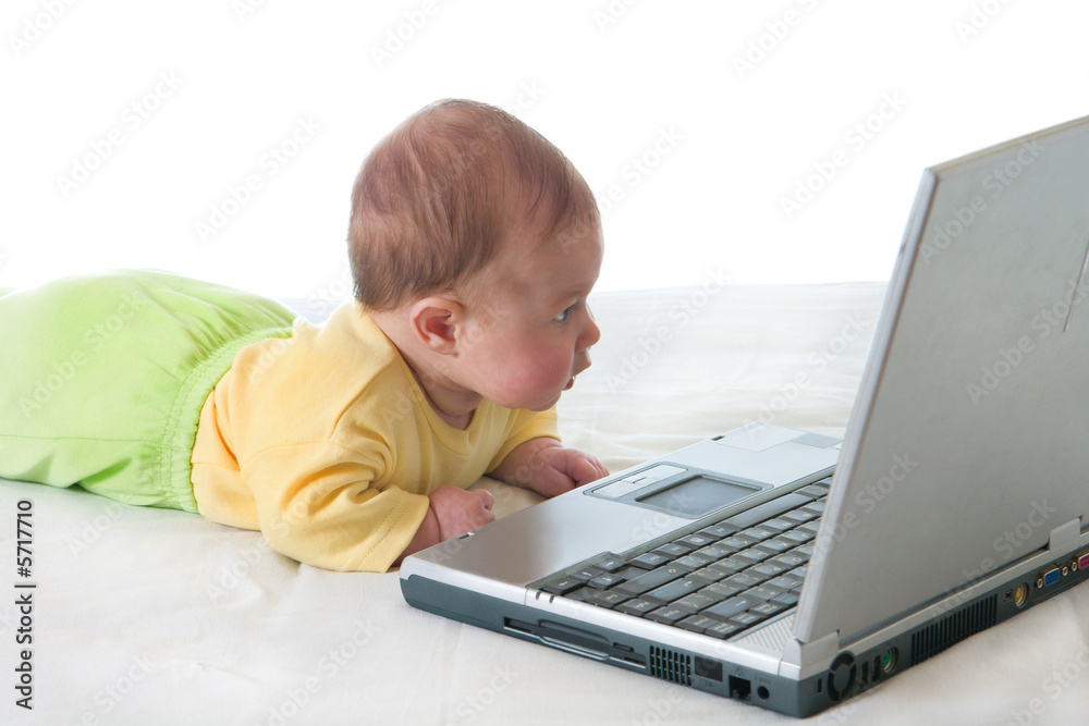 Small baby with laptop