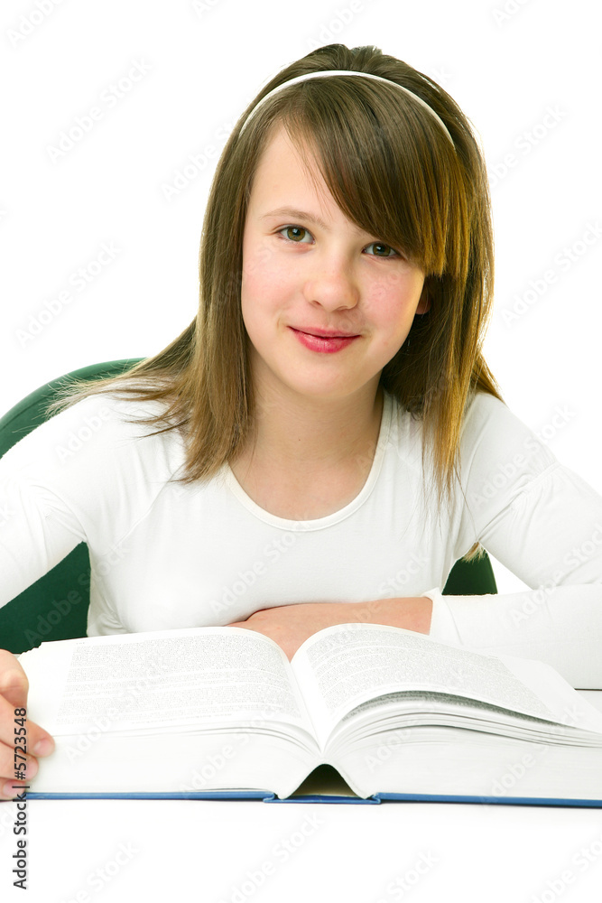 Portrait of Happy young schoolgirl reading book Portrait of Happy young schoolgirl reading book