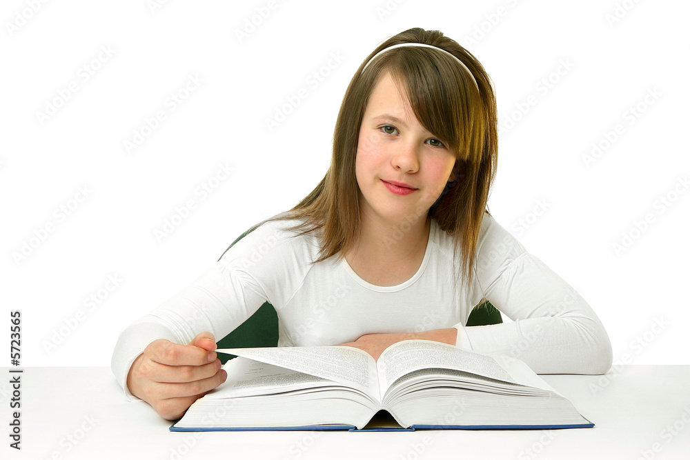Portrait of Happy young schoolgirl reading book Portrait of Happy young schoolgirl reading book