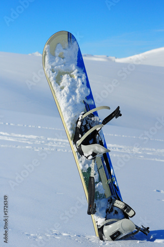 snowboard in winter ski resort blue sky
