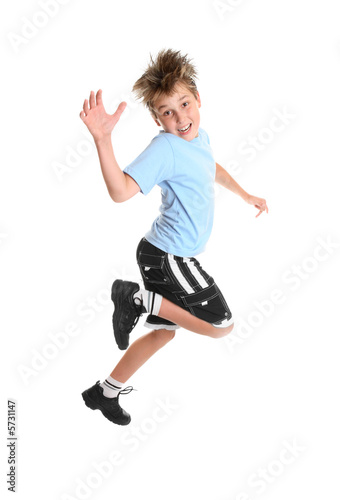 Hopping or skipping child showing happiness.