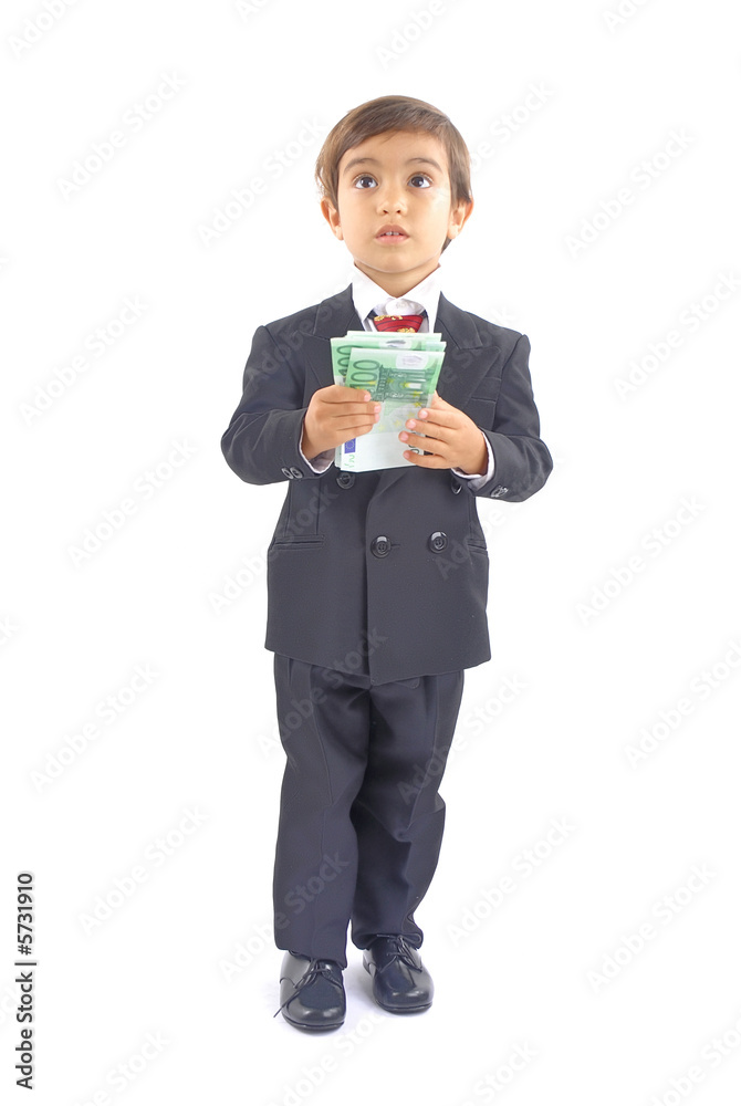 Boy with formal clothes holding some euros currency. Boy with formal clothes holding some euros currency.