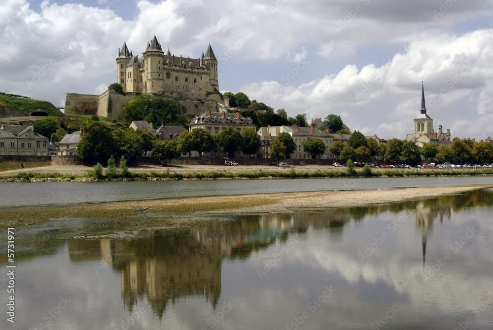 The chateau at saumur on the banks of the river loire.