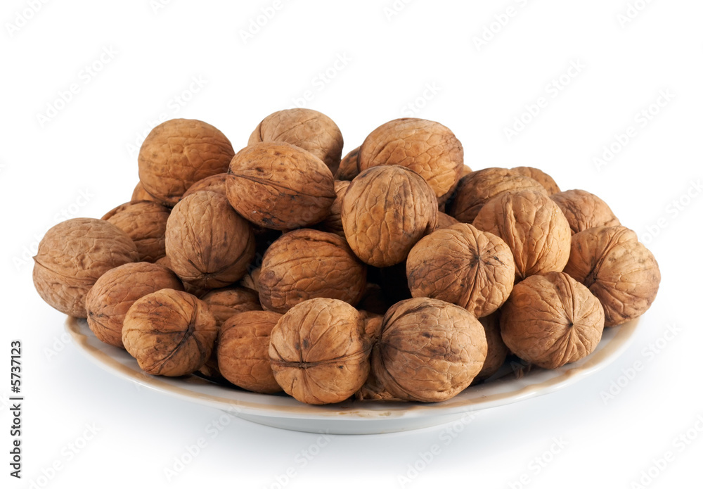 Nuts garden-stuf in plate (isolated on white) Nuts garden-stuf in plate (isolated on white)