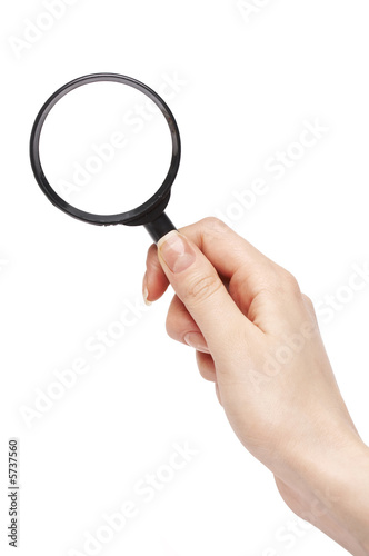 woman holding magnifying glass