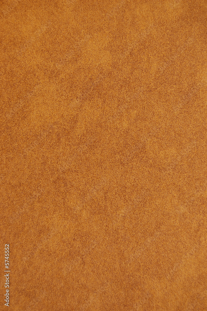 Brown recycled speckled cardboard paper background Brown recycled speckled cardboard paper background