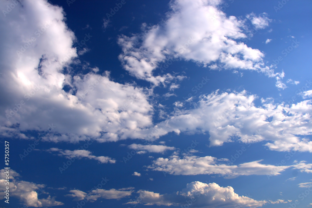 Beautiful white clouds on the blue sky - background texture