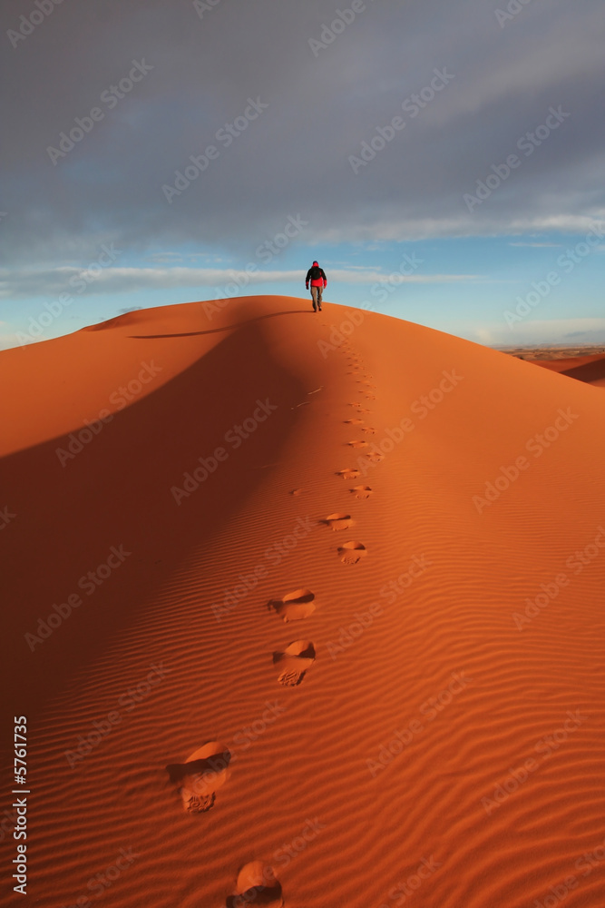 Man observer sand desert Man observer sand desert