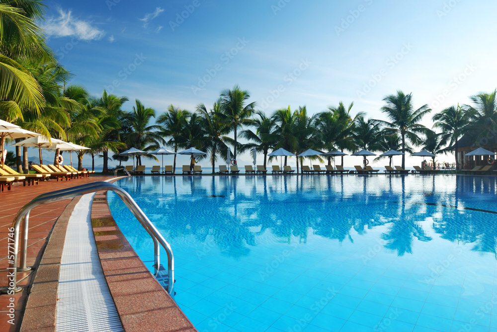 Tropical pool in luxury hotel