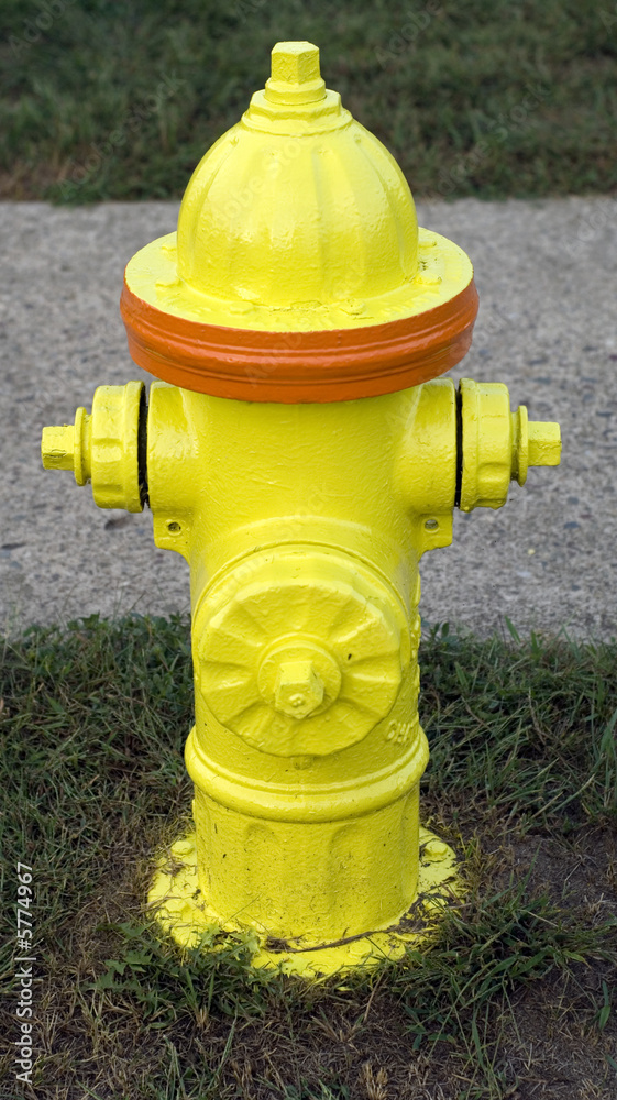 Fire hydrant with orange stripe outdoors Fire hydrant with orange stripe outdoors