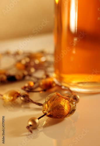 Amber heart on necklace with golden pearls