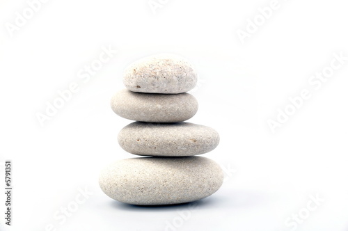 pile of river stones on white background