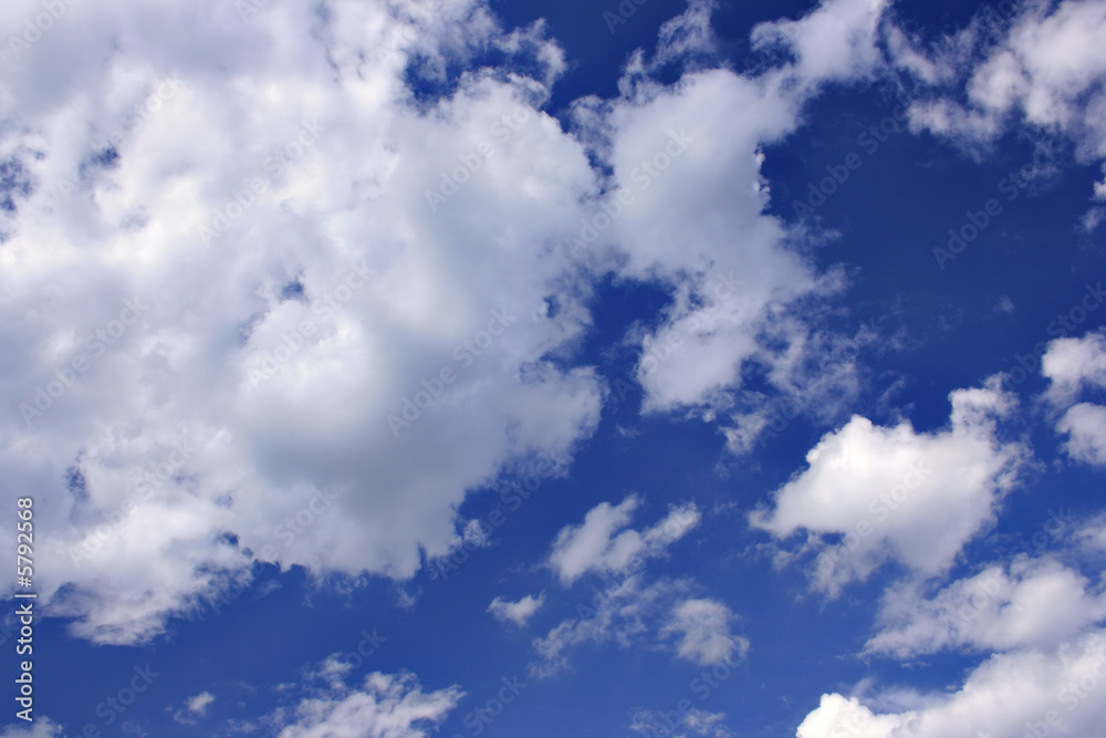 Clouds against a deep blue sky, may be used as background Clouds against a deep blue sky, may be used as background