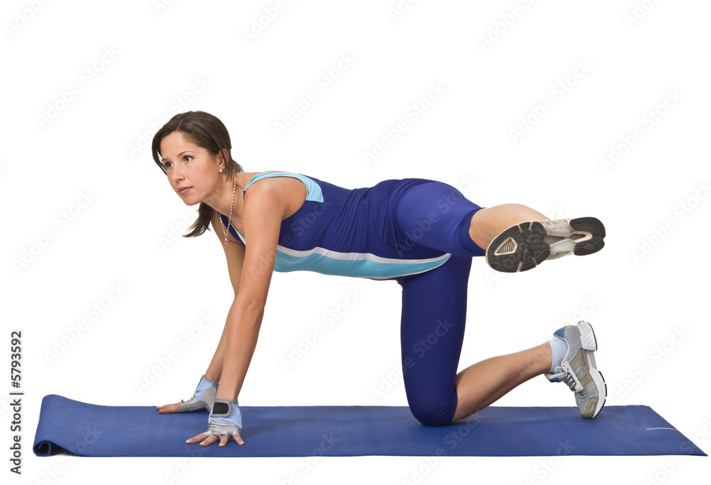 Image of a young woman doing stretching movements. Image of a young woman doing stretching movements.