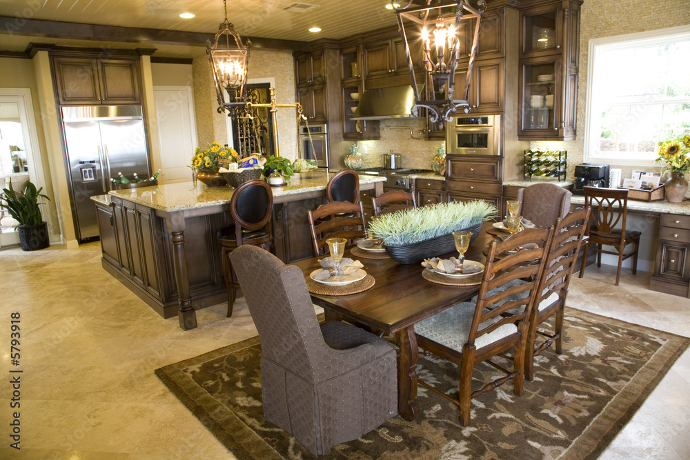 Luxury home kitchen with a breakfast table.