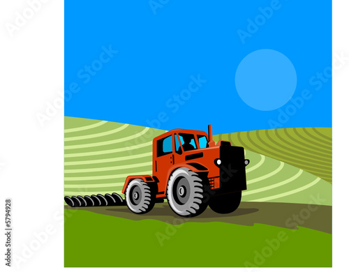 Tractor plowing the farm